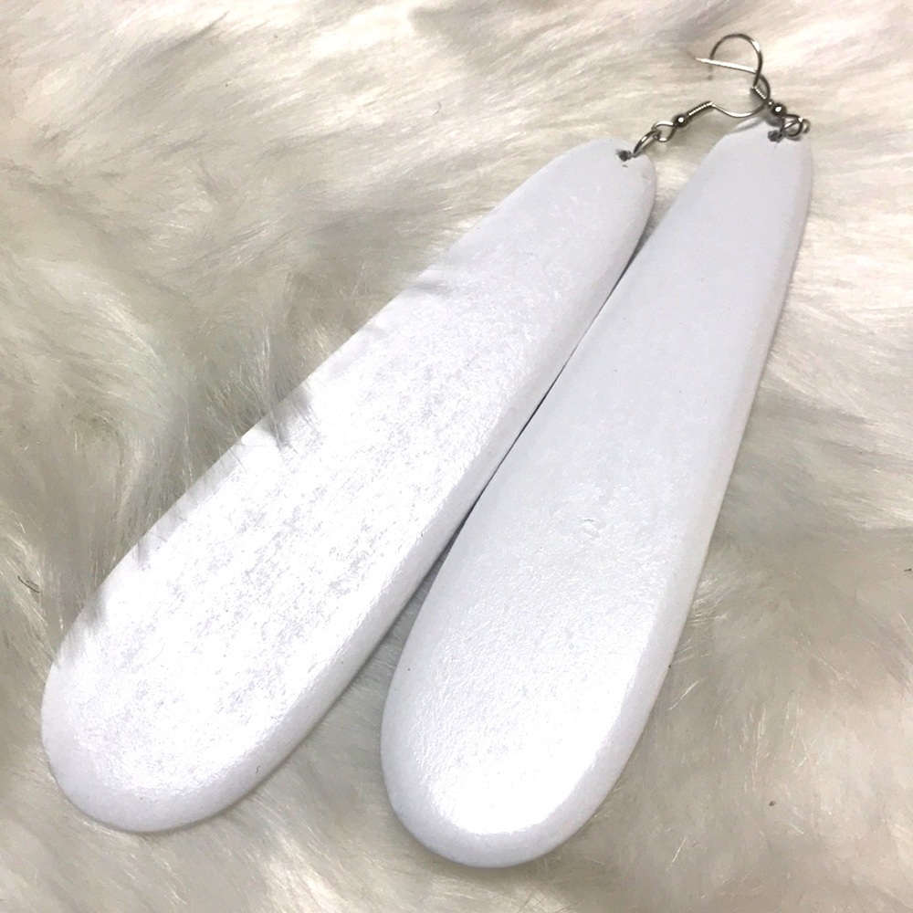 Long white wooden shaped earrings